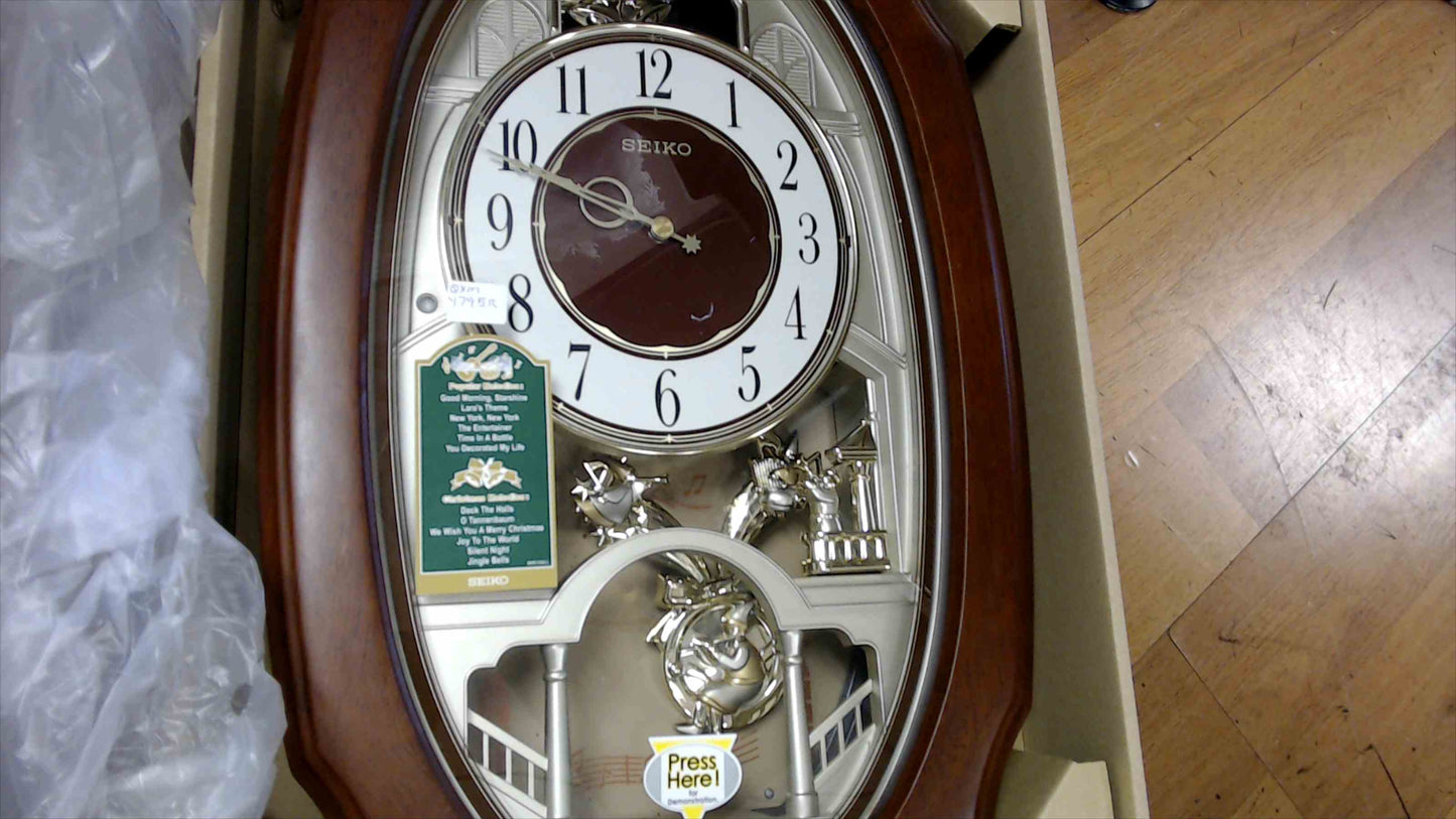 Seiko Melodies in Motion Musical Wall Clock – QXM479BR – Brown Oval Case