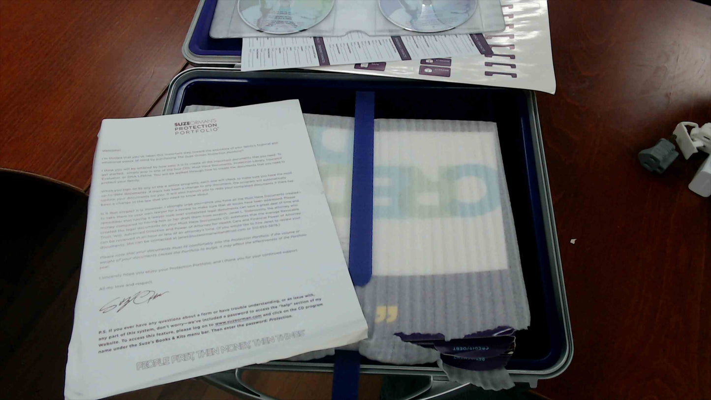 Suze Orman’s Protection Portfolio – Hard-Shell Case Organizer w/ 4 CD-ROMs & Forms