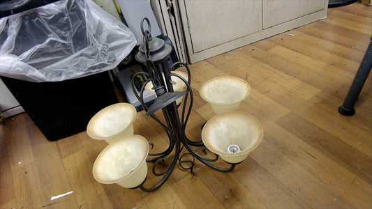 5-Light Bronze Scroll Chandelier with Amber Glass Shades – Traditional Hanging Fixture