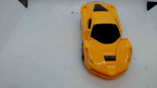 Transforming Robot Car – Talking Battery-Operated Auto Toy (Says “Autobots, Transform and Roll Out”)
