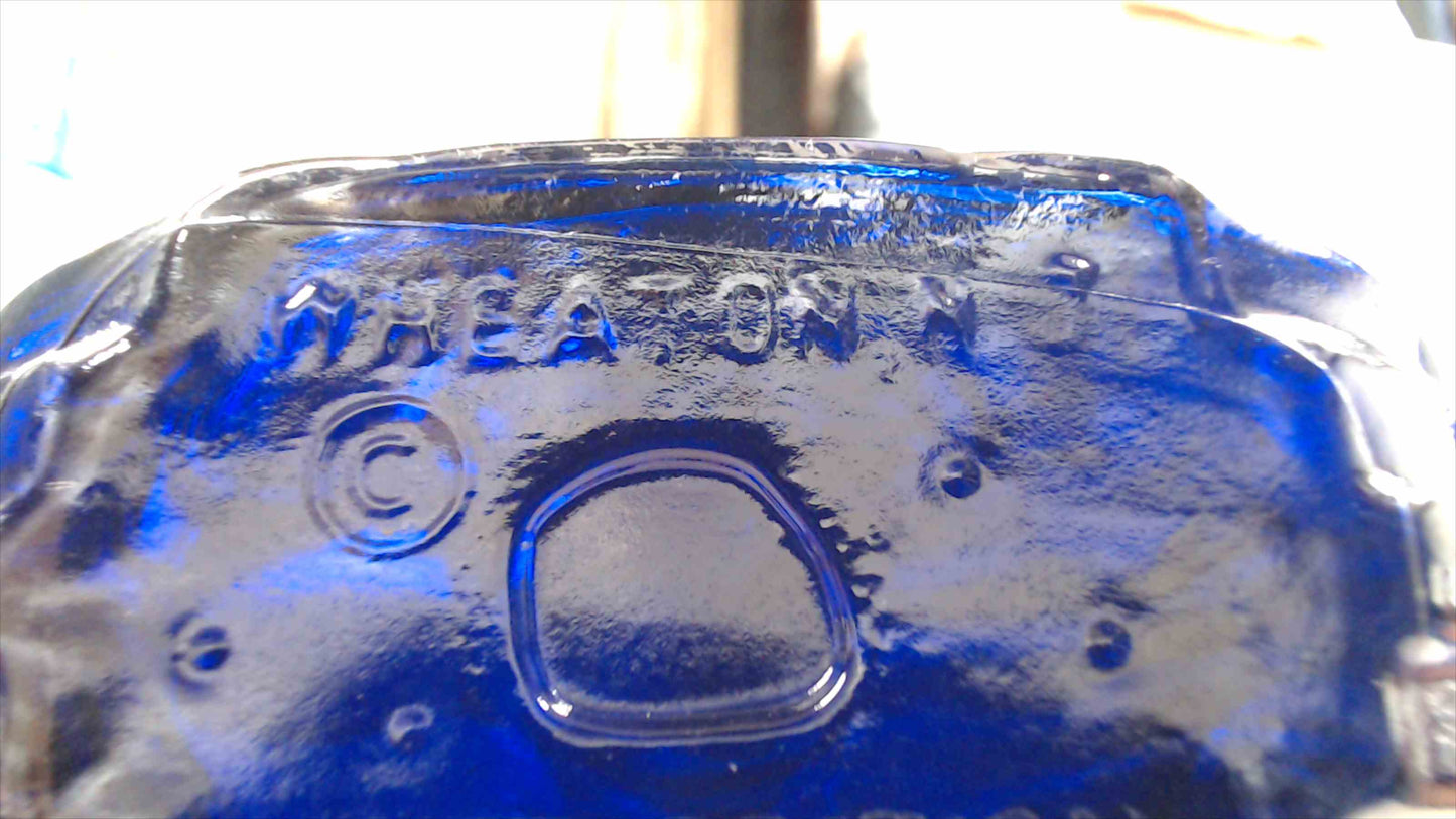 Wheaton “Theodore Roosevelt” First Edition Iridescent Cobalt Glass Bottle