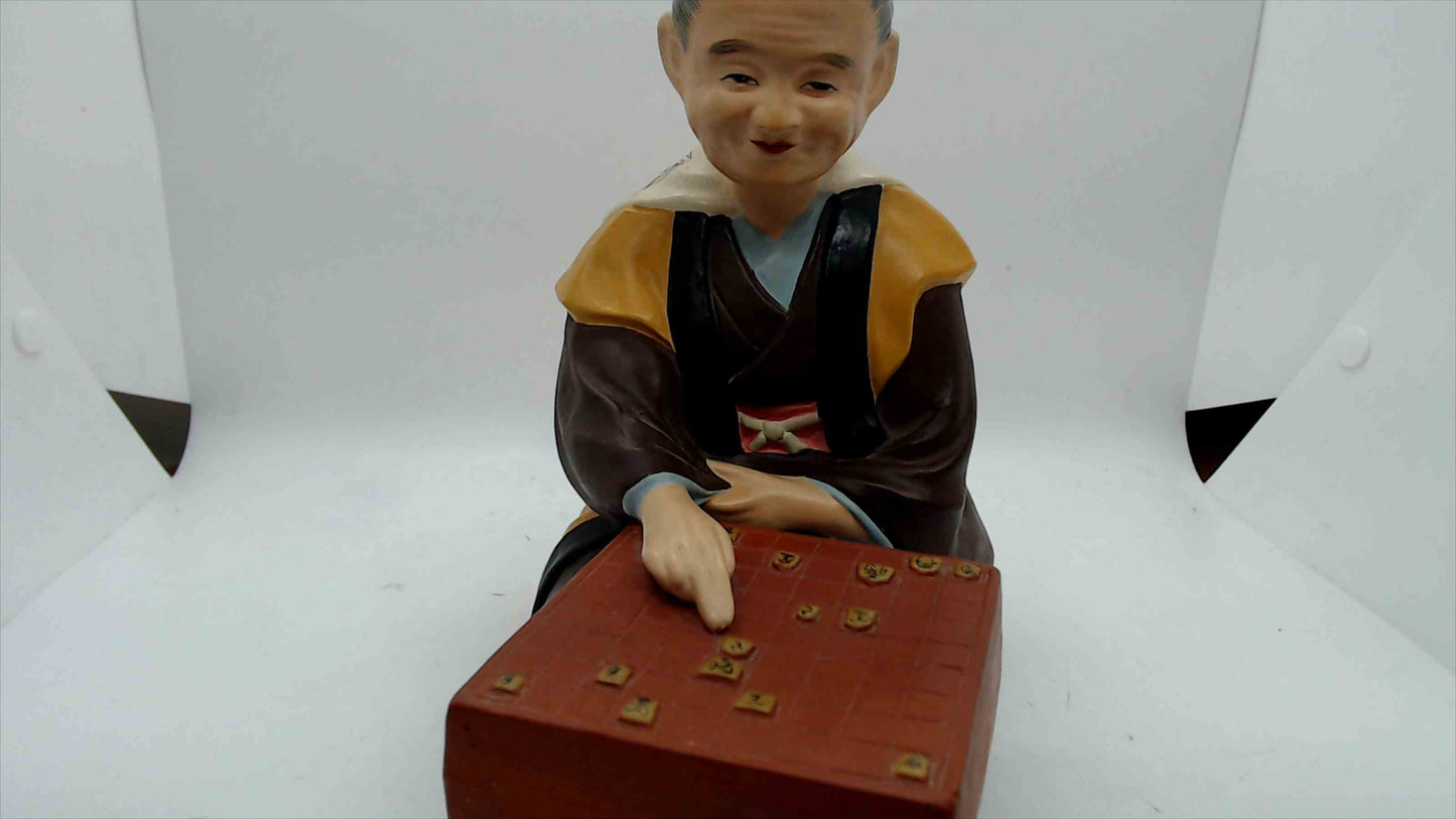 Vintage Japanese Figurine of Elderly Man Playing Shogi – Hand-Painted Ceramic