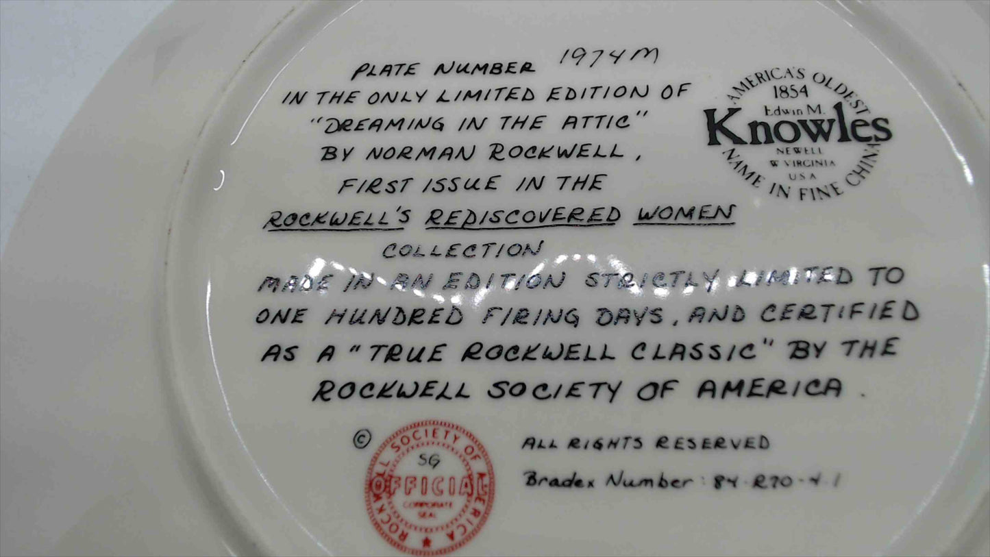 Edwin M. Knowles Norman Rockwell Collector Plate – “Dreaming in the Attic” (Rockwell’s Rediscovered Women, 1st Issue) – Bradex 84-R70-4.1