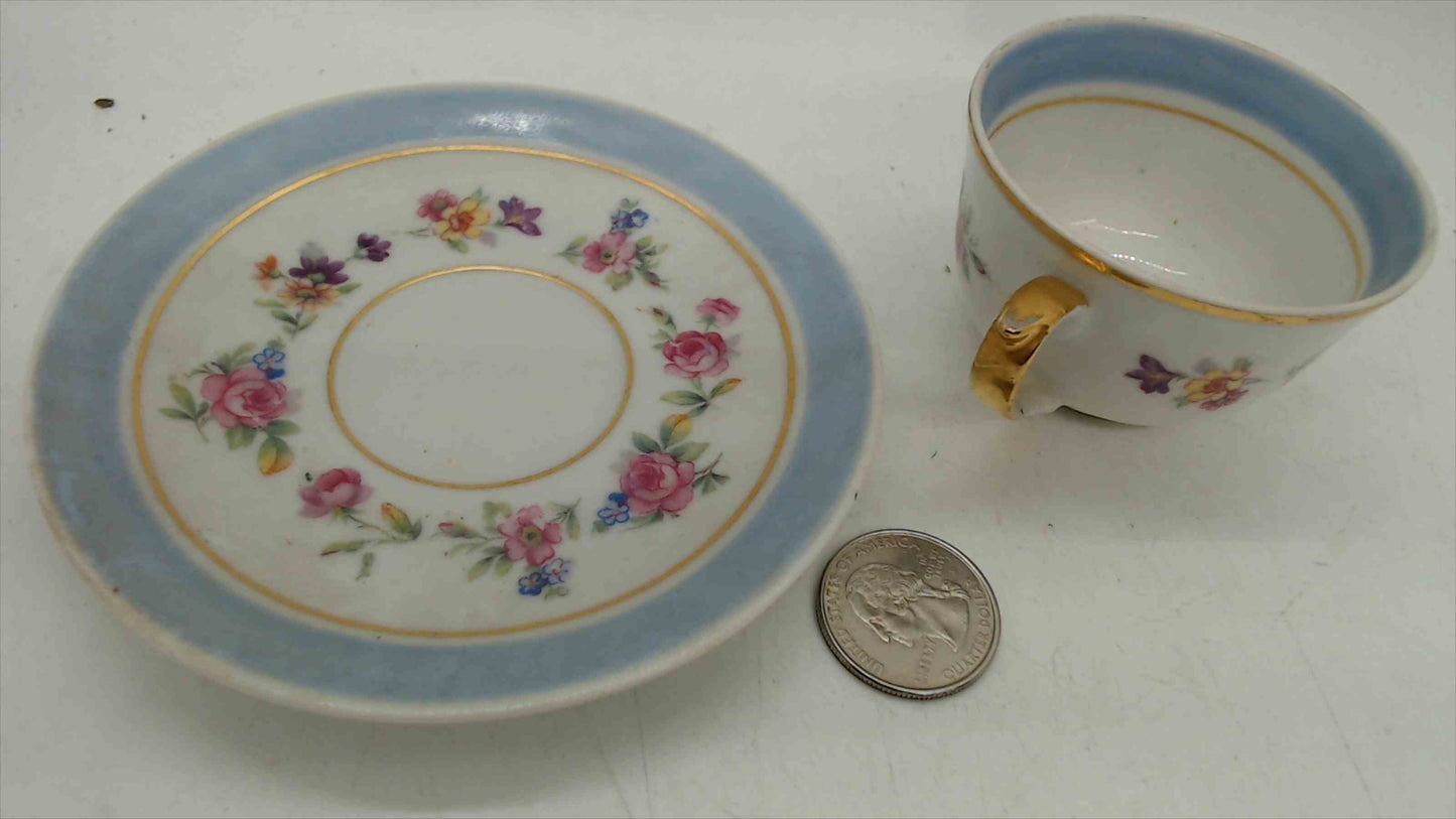 L.T. France Limoges Demitasse Cup & Saucer – Powder Blue, Mixed Floral Garland, Gold Gilt