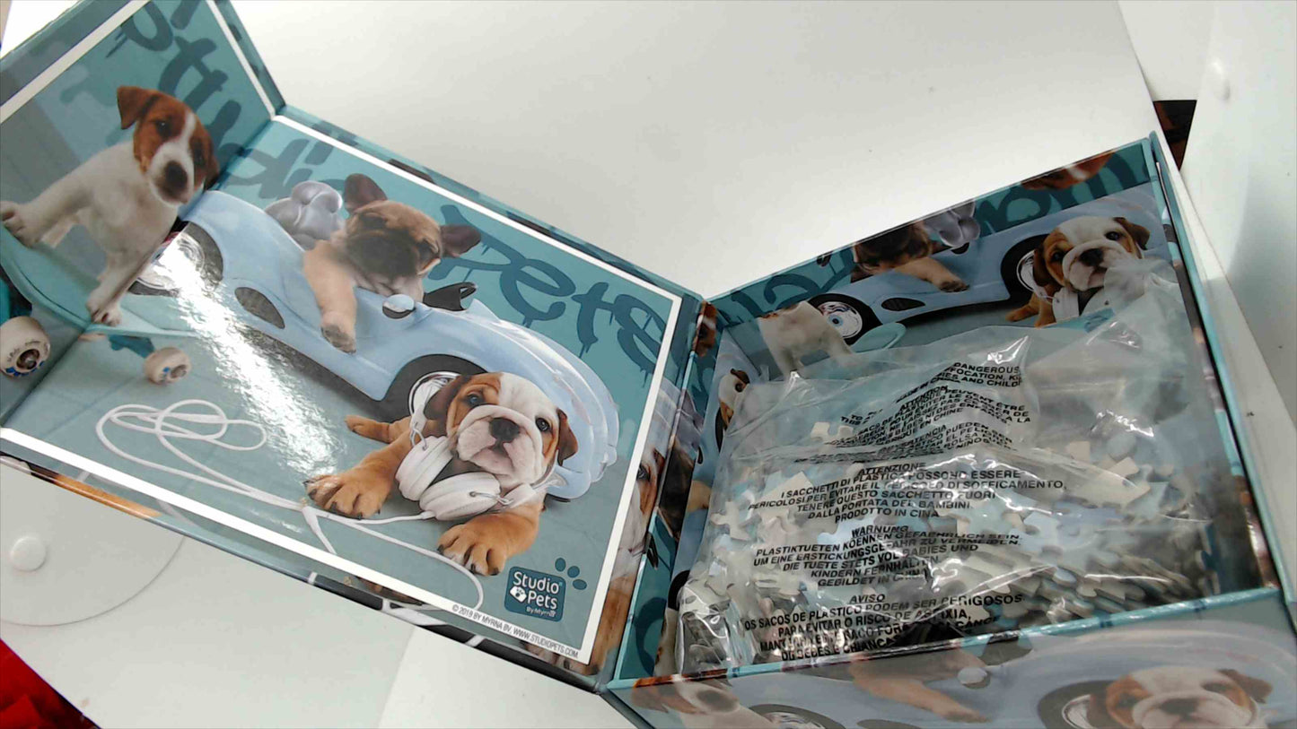 Studio Pets by Myrna Jigsaw Puzzle – Puppies & Cool Car Scene – Pieces Sealed in Bag
